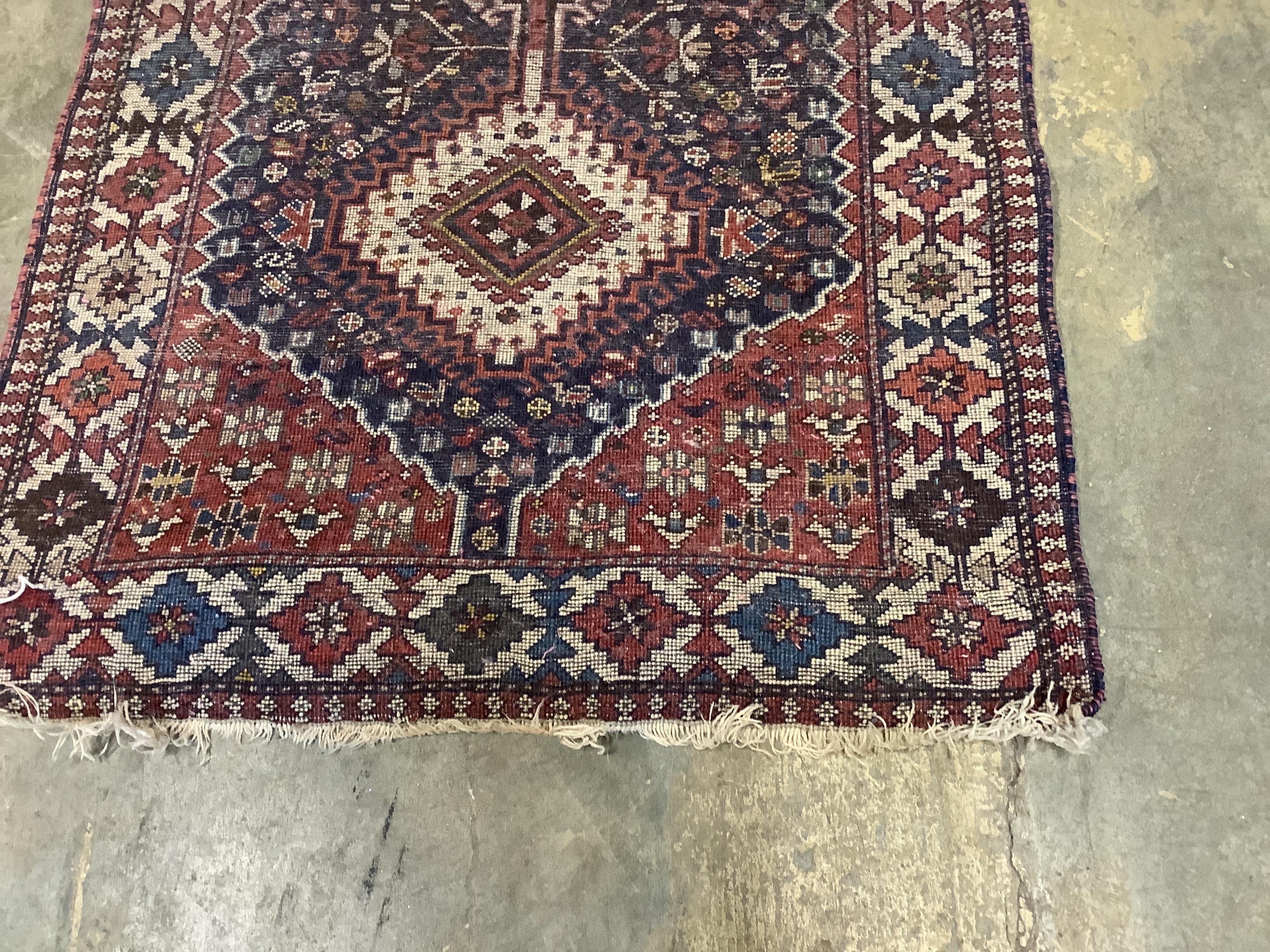 A Caucasian style blue ground rug, 146 x 78cm